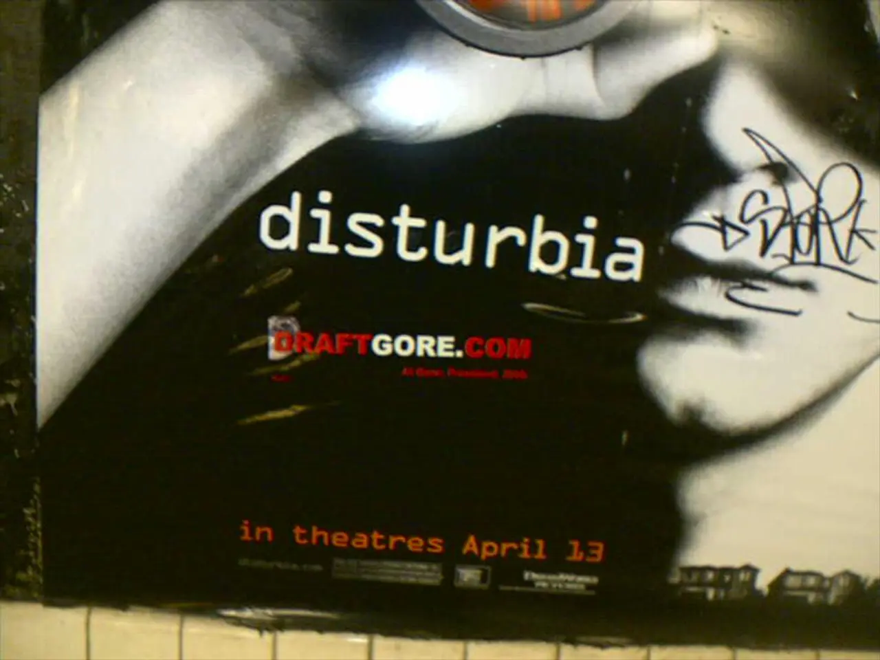 This is an advertisement. In this picture we can see a poster on the wall.