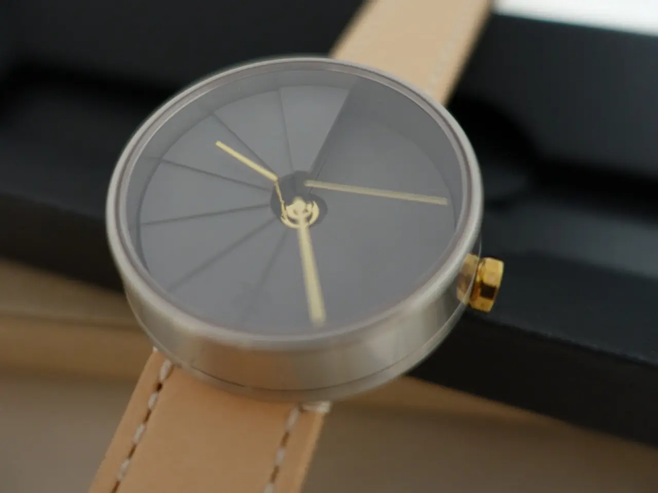 In this image I can see the watch. Background is in black and brown color.