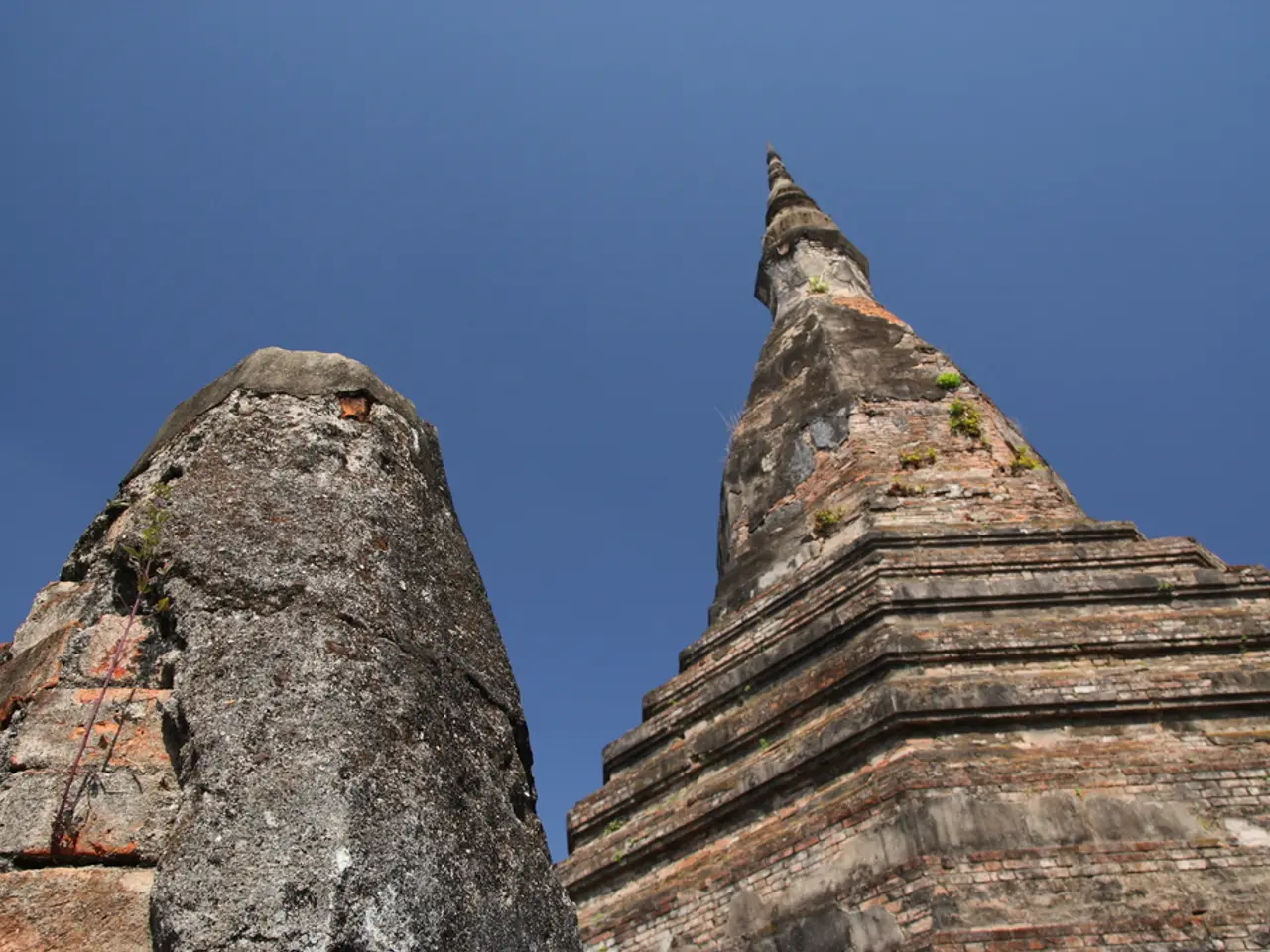 In this image, this looks like a rock pyramid. This looks like a rock surface. Here is the sky,...