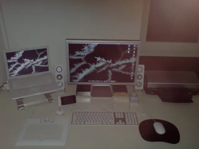 Redefining Multitasking: Touchscreen Laptop Placed beside Keyboard