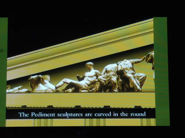 In this image it looks like a screen with text and image of sculptures.