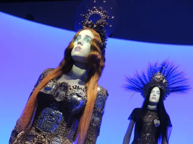 Here in this picture we can see a couple of mannequins present over a place and they are wearing...